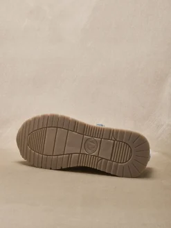 Baskets fermées par zip et lacets