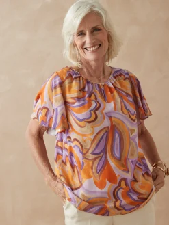 Blouse manches papillon