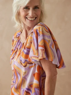 Blouse manches papillon