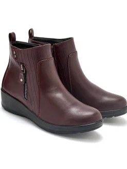 Boots fourrées compensées double zip