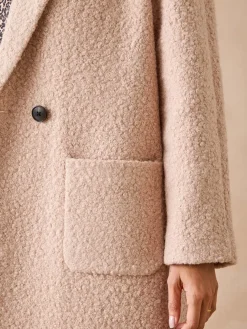 Manteau tissu bouclette