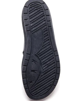 Mules à perforations fantaisie