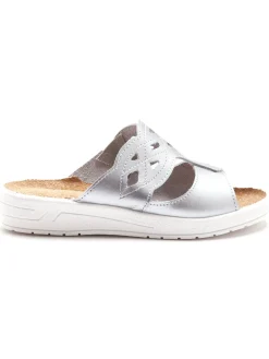 Mules à perforations fantaisie