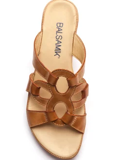 Mules en cuir à talon compensé