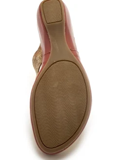 Mules en cuir à talon compensé