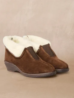 Pantoufles croûte de cuir fourrées