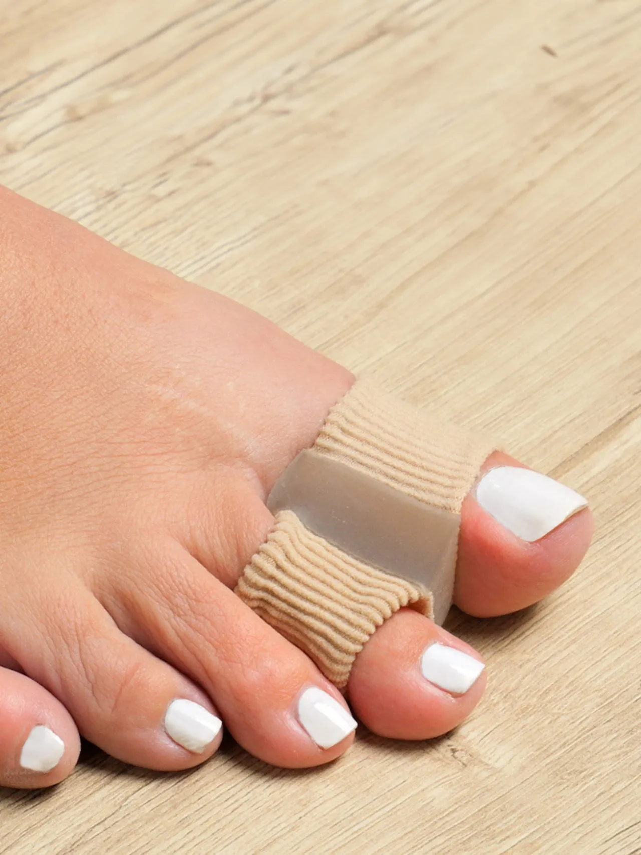 Protège et séparateur d’orteils double