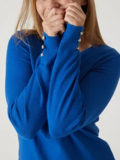 Pull boutons-bijoux aux manches