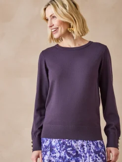 Pull boutons-bijoux aux manches