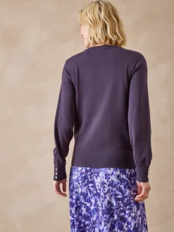 Pull boutons-bijoux aux manches