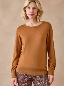 Pull boutons-bijoux aux manches