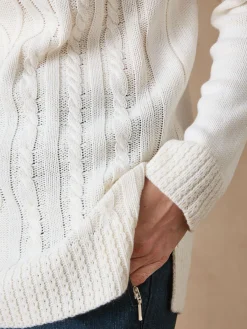 Pull col montant maille torsadée