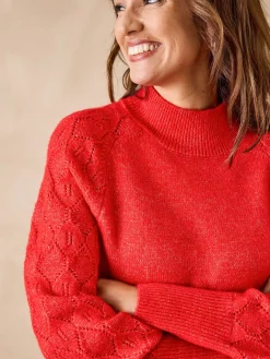 Pull col montant manches fantaisie