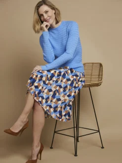 Pull en maille finement torsadée