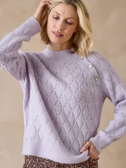 Pull maille fantaisie col montant