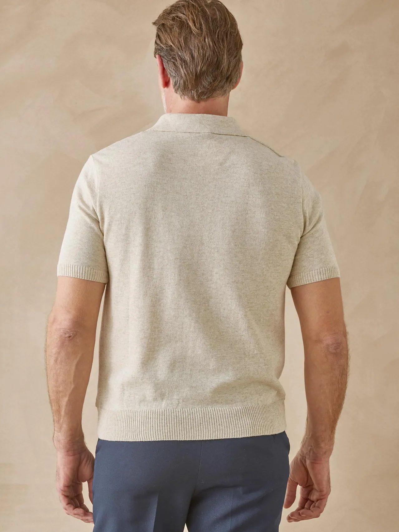 Pull polo zippé manches courtes