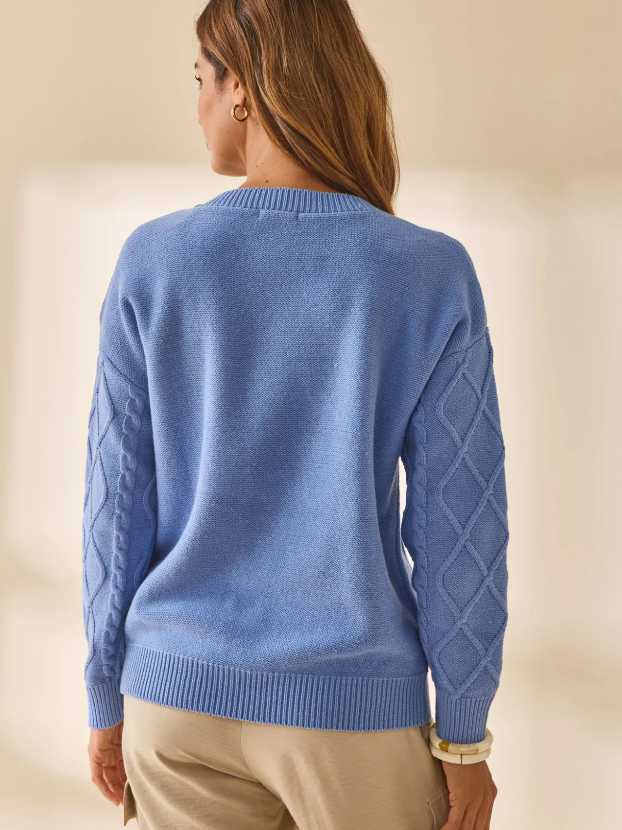 Pull torsadé col rond