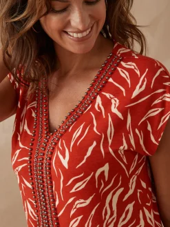 Robe en maille avec perles fantaisie