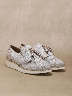 Sans-gêne à pompons élastiqués côtés