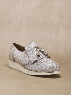 Sans-gêne à pompons élastiqués côtés