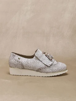 Sans-gêne à pompons élastiqués côtés