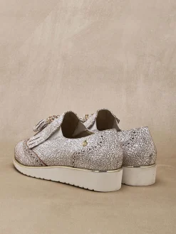 Sans-gêne à pompons élastiqués côtés