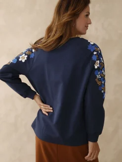 Sweat-shirt fantaisie manches brodées