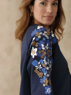 Sweat-shirt fantaisie manches brodées