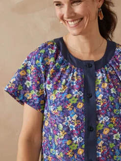 Tablier boutonné forme housse