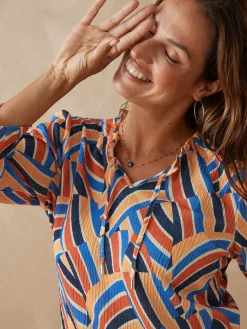 Tee-shirt maille gaufrée col volanté